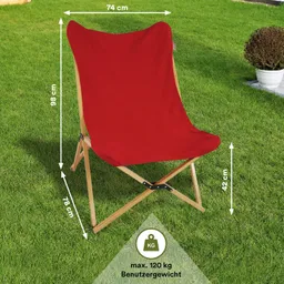 Roter Klappstuhl auf grünem Rasen, umgeben von einer Pflanze in einem Topf. Maße und Maximalgewicht angegeben.