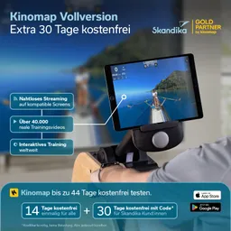 Tablet auf einer Rudergerät-Halterung zeigt eine Landschaft mit Wasser und Bergen. Textinformationen zu einem Fitnessprogramm und Testangeboten.