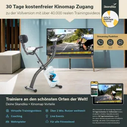 Fahrrad-Ergometer von Skandika vor einem Fernseher, der ein Trainingsvideo zeigt. Informationen zu Kinomap-Zugang und Vorteilen sind eingeblendet.