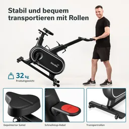 Heimtrainer mit schwarzem Gehäuse, gepolstertem Sattel und Transportrollen. Person zieht das Gerät. Gewicht: 32 kg.
