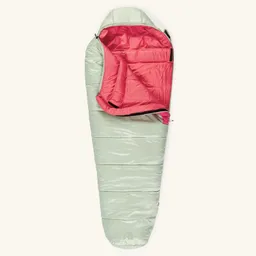 Schlafsack in hellgrün mit rotem Innenfutter, geöffnet und liegend, zeigt die Struktur und Fütterung.