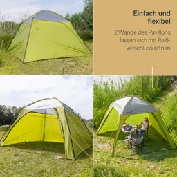 Zelt in grüner und grauer Farbgestaltung, umgeben von Gras und Bäumen. Im unteren Bildbereich sitzen zwei Personen an einem Tisch.