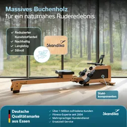 Rudergerät aus massivem Buchenholz mit schwarzem Sitz und Fußschlaufen, platziert vor großen Fenstern mit Waldansicht.