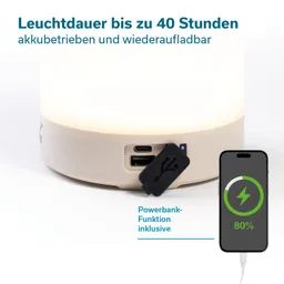 Akku-Lampe mit USB-Anschlüssen, batteriebetrieben und aufladbar, daneben Smartphone mit Ladeanzeige.