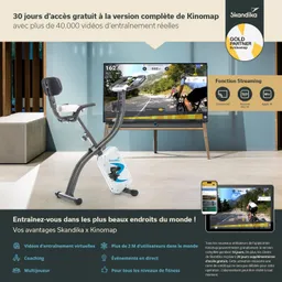 Ein Heimtrainingsgerät steht vor einem Fernseher, der eine Fahrradtour zeigt. Darunter sind Informationen zu Kinomap und Vorteilen.