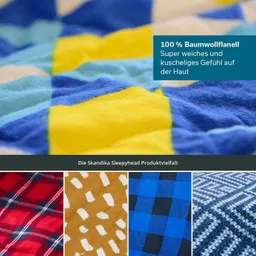Bunte Stoffmuster aus Baumwollflanell in Gelb, Blau, Rot und Beige auf einem weichen Hintergrund.