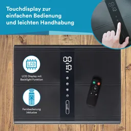 Touchdisplay eines Geräts mit LCD-Anzeige, Fernbedienung und Bedienungselementen auf einem Holzuntergrund.