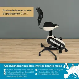 Bürostuhl mit integrierter Pedaleinheit, schwarze Sitzfläche, graue Rückenlehne, auf Holzfußboden.