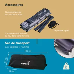 Zusammengelegtes Chassis aus Aluminium und Stahl, Zubehör wie eine Fußpumpe und ein schwarzer Transportbeutel mit Rollen.