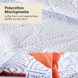 Polyester-Bettdecke mit weißem Stoff und schwarzer, quadratischer Musterung. Farbige, orange Akzente an den Kanten.
