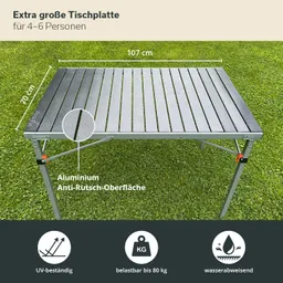 Große Tischplatte aus Aluminium auf grünem Rasen, geeignet für 4-6 Personen, mit Anti-Rutsch-Oberfläche.