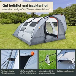 Zelt in der Natur mit zwei großen Türen und Moskitonetzen, umgeben von Gras und Bäumen, mit verschiedenen Details zu Ausstattung.