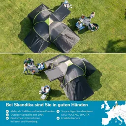 Zelt in schwarz mit grünen Akzenten auf einer grünen Wiese. Personen sitzen in Stühlen und essen. Tische sind sichtbar.