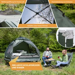 Ein grünes Zelt im Freien mit Belüftungsöffnung und Dachabdeckung. Zwei Personen sitzen vor dem Zelt, Getränke und Snacks auf einem Tisch.
