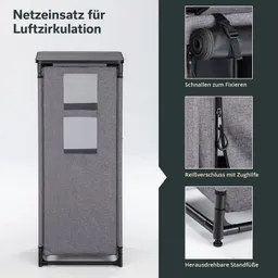 Grauer Netzeneinsatz mit zwei Fensteröffnungen, oben eine schwarze Platte, links und unten verschiedene funktionale Details.