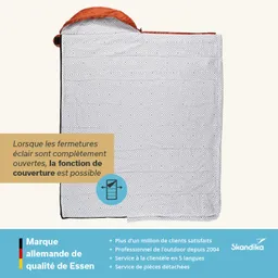 Schlafsack mit Reißverschluss und einem weißen Muster, beschriftet mit Gebrauchsanweisungen und Informationen in verschiedenen Sprachen.