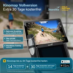 Fitnessgerät mit Bildschirm, der ein Laufvideo zeigt. Textinformationen zu Kinomap und unverbindlichen Testangeboten sind sichtbar.