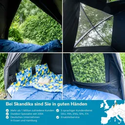 Zeltinnenseite mit blauer Schlafdecke und Kissen in gelb-blauem Design. Sicht auf grüne Bäume und Sträucher.