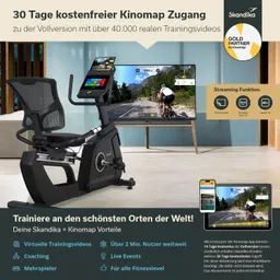 Ein Fitnessgerät steht vor einem Fernseher, der ein Landschaftstrainingsvideo zeigt. Informationen zu Kinomap und Vorteilen sind sichtbar.