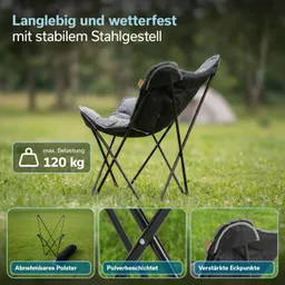Faltstuhl mit stabilem Stahlgestell und abnehmbarem Polster, auf einem grünen Rasen im Freien.