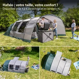 Öffentlich zugängliches Zelt auf Wiese mit mehreren Fenstern und einem Tischgrill. Personen stehen und sitzen in der Nähe.