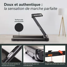 Laufband mit schwarzer Oberfläche und Haltegriff, abgebildet in einem modernen Raum mit einer Stehlampe.