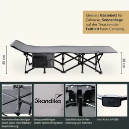 Faltbares Bett aus grauem Stoff mit schwarzem Gestell, Seitenfach und abgerundeten Kanten. Maße: 48 cm hoch, 38 cm breit.