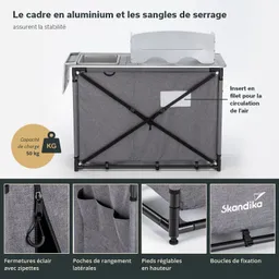 Graue, faltbare Ablage mit Aluminiumrahmen, seitlichen Taschen und verstellbaren Füßen. Kapazität 50 kg.