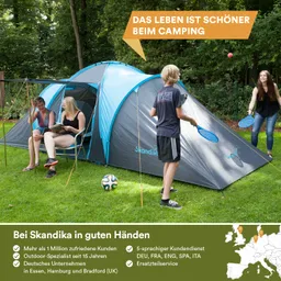 Zelt in der Natur mit zwei Frauen, die lesen, und zwei Personen, die mit Schlägern spielen. Fußball im Gras.