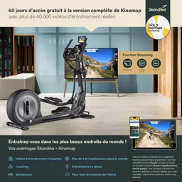 Ein elegantes Heimtrainer-Gerät steht vor einem Fernseher in einem modernen Raum. Auf dem Fernseher sind Landschafts-Trainingsvideos sichtbar. Ein Tablet zeigt zusätzliche Informationen und Funktionen.