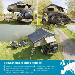 Dachzelt auf einem SUV in der Natur, angrenzender See, zwei Personen am Tisch mit Grill, Bäume im Hintergrund.