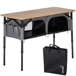 Faltbarer Camping-Tisch mit Bambusoberfläche, grauer Stoffumrandung und Stauraum, daneben eine schwarze Tragetasche.