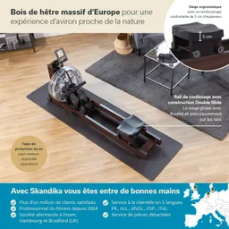 Rudergerät aus massiven europäischen Buchenholz, ergonomischer Sitz auf einem dunklen Teppich vor einer Couch.