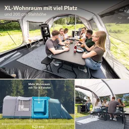 Innenansicht eines großen Zeltes mit einem Tisch, an dem mehrere Personen sitzen. Um sie herum sind Stühle und eine Küchenzeile sichtbar. Ein Außenbereich ist teilweise zu sehen.