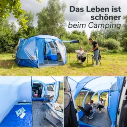 Ein großes blaues Zelt steht auf einer Wiese, zwei Personen sitzen am Tisch, umgeben von Bäumen.