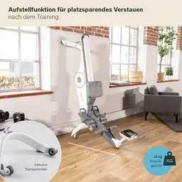 Trainingsgerät mit Aufstellfunktion steht in einem Raum mit Fenstern. Neben dem Gerät ist ein Sofa und einige Kameras sichtbar.