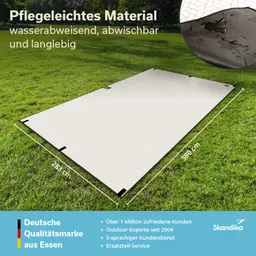 Lagerfläche aus pflegeleichtem, wasserdichtem Material auf einer grünen Wiese, mit Maßangaben und Logos.
