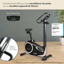 Fitnessgerät in modernem Design, mit Sitz, Lenker und integriertem Pulssensor. Hintergrund in hellen Farben.