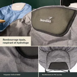Grau- und blauen Campingstuhl mit gepolsterter Rückenlehne, Texturen und Materialien an mehreren Stellen sichtbar.