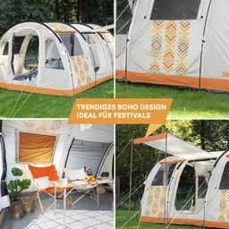 Gestreiftes Zelt im Boho-Design, umgeben von Wiese. Innenbereich mit Tisch, Stühlen und Obst. Dekorative Elemente sichtbar.