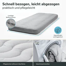 Matratze mit grauem Bezug und zweiseitigem Reißverschluss, Pflegehinweise für waschmaschinenfeste Oberfläche.
