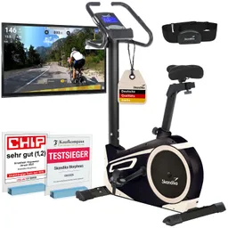 Ergometer mit Monitor, Herzfrequenzgurt und Auszeichnungen für gute Qualität. Bildschirm zeigt Fahrradtour im Freien.