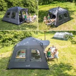 Zelt in der Natur, umgeben von Bäumen, Menschen sitzen an einem Tisch. Auf dem Tisch liegt Essen.