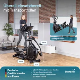 Ellipsentrainer in einem modernen Raum mit einer Person, die darauf trainiert. Maße und Transportrollen sind sichtbar.