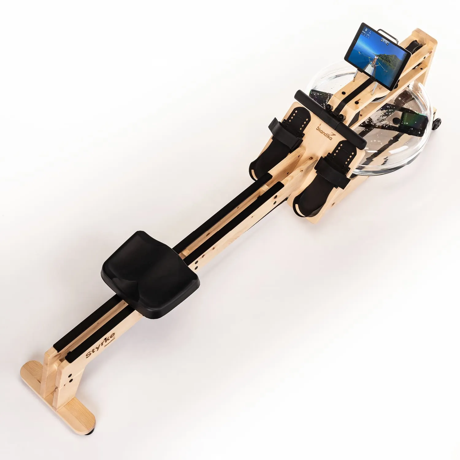 Rudergerät aus Holz mit einer transparenten Wasserbehälter und einem Tablet-Halter. Die Sitzfläche und Fußstützen sind schwarz.
