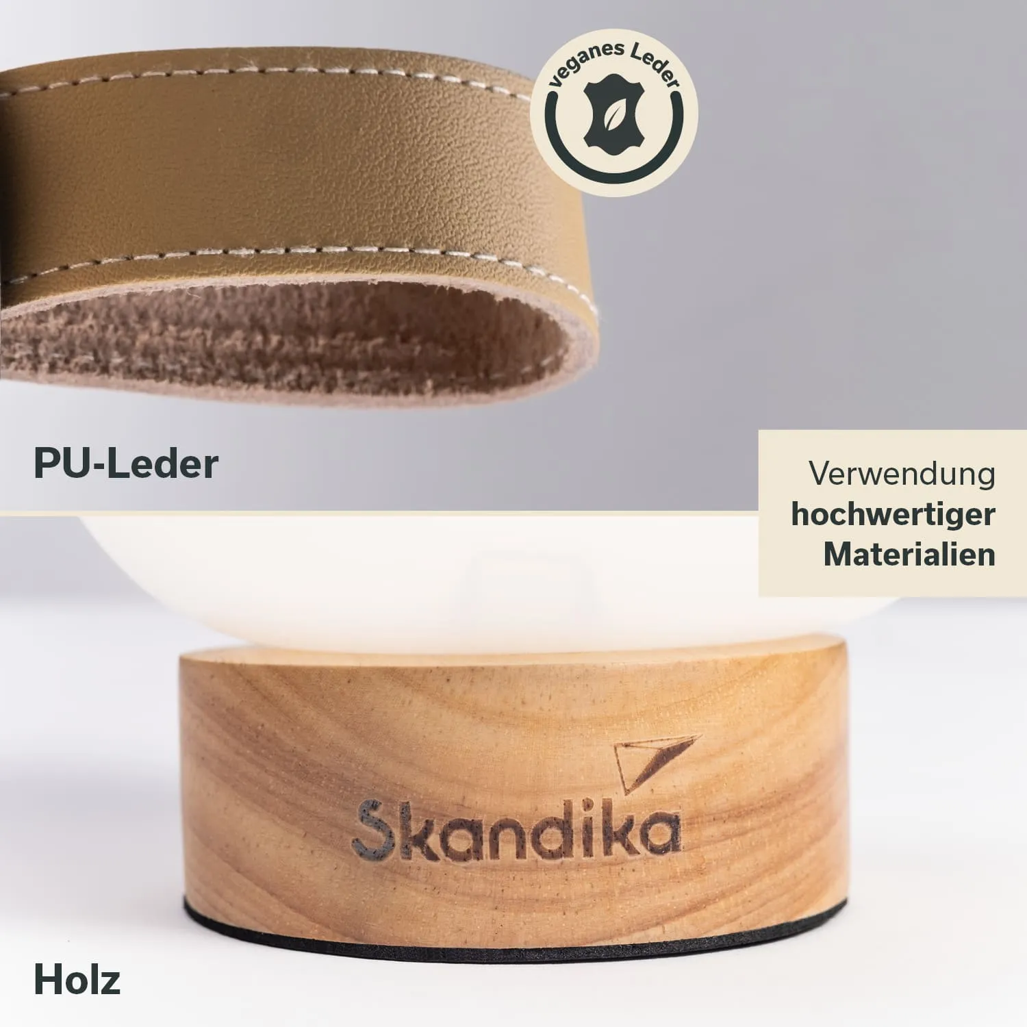 Brauner PU-Lederband mit weißen Nähten oben, darunter ein Holzfuß mit eingraviertem Schriftzug "Skandika".