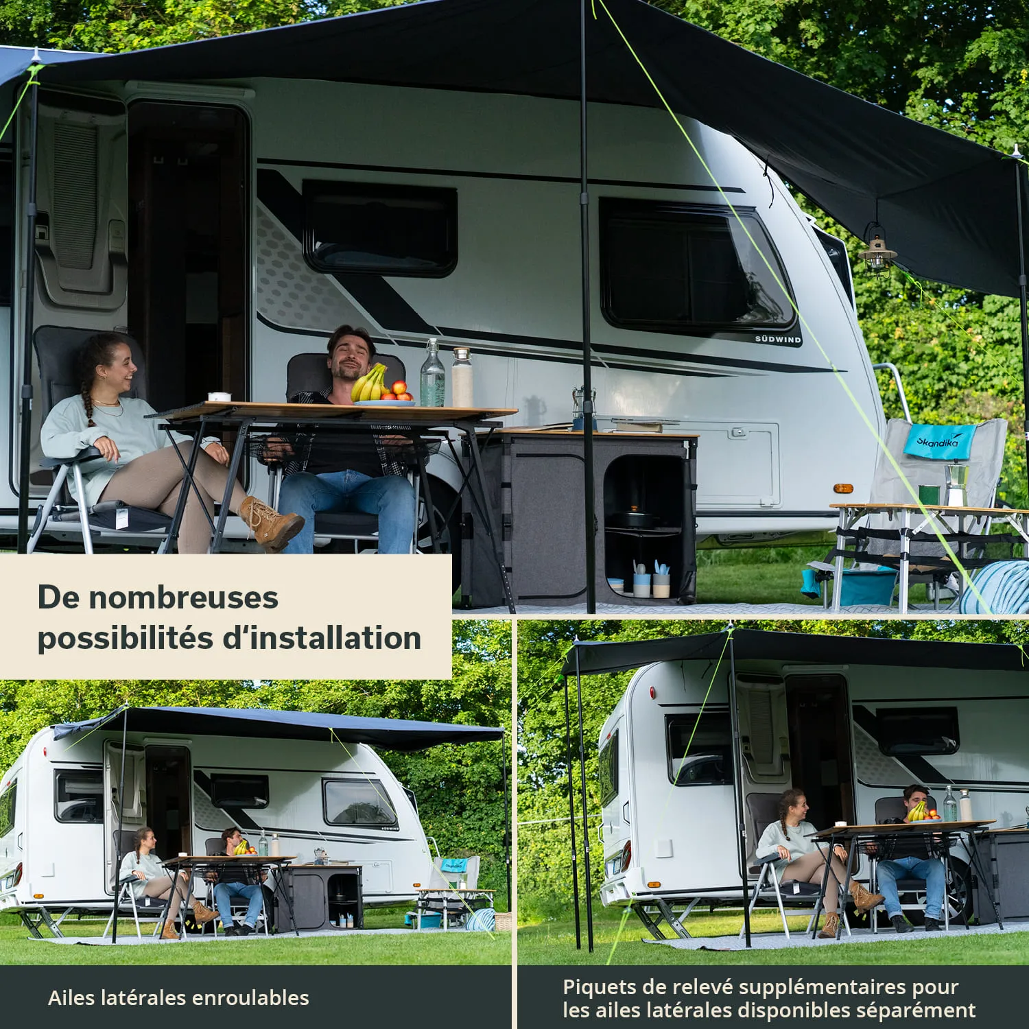 Caravan mit offenem Vorbau, zwei Personen sitzen an einem Tisch, Obst und Getränke sind sichtbar. Umgeben von Bäumen.