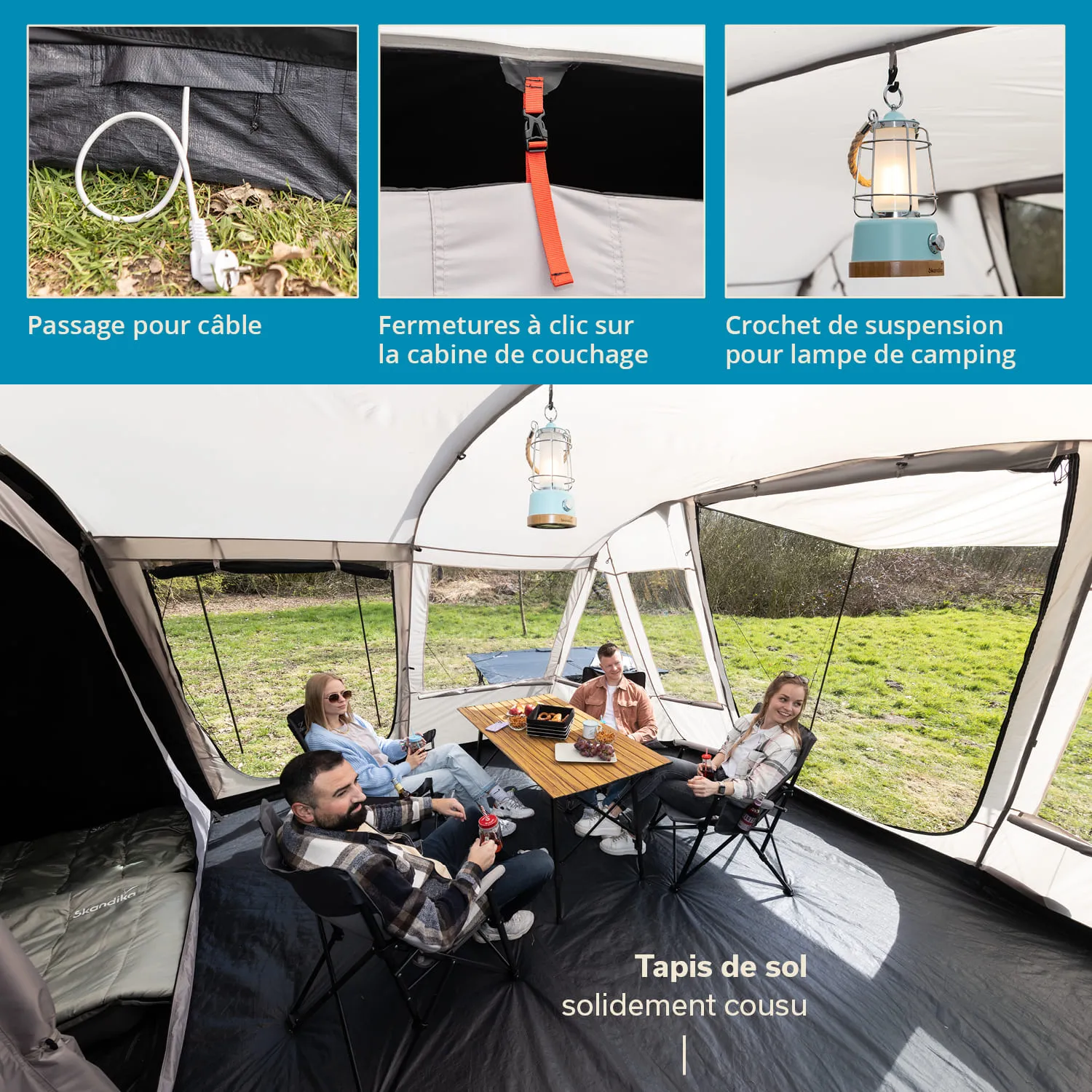 Zeltinnenansicht mit vier Personen, die an einem Tisch sitzen. Hängende Lampe und Schlafbereich sichtbar.