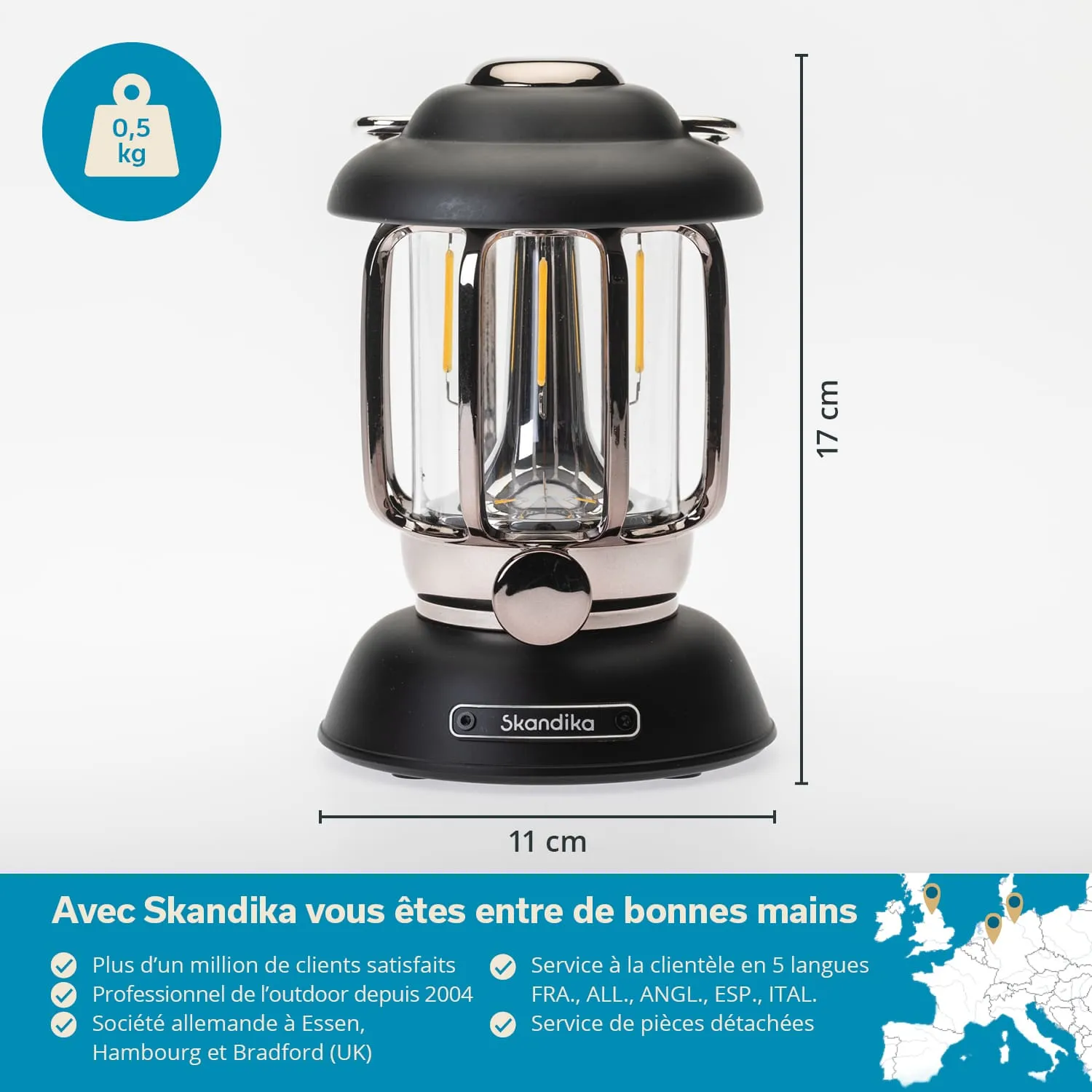 Eine schwarze LED-Lampe mit silbernen Akzenten, Höhe 17 cm und Durchmesser 11 cm, auf weißem Hintergrund.