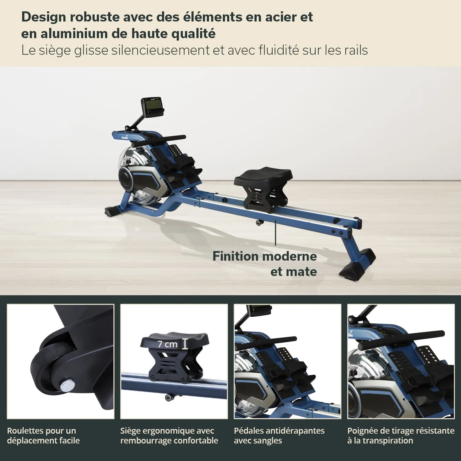 Rudergerät aus Stahl und Aluminium mit ergonomischem Sitz, stabilen Pedalen und moderner Oberfläche auf einem hellen Boden.